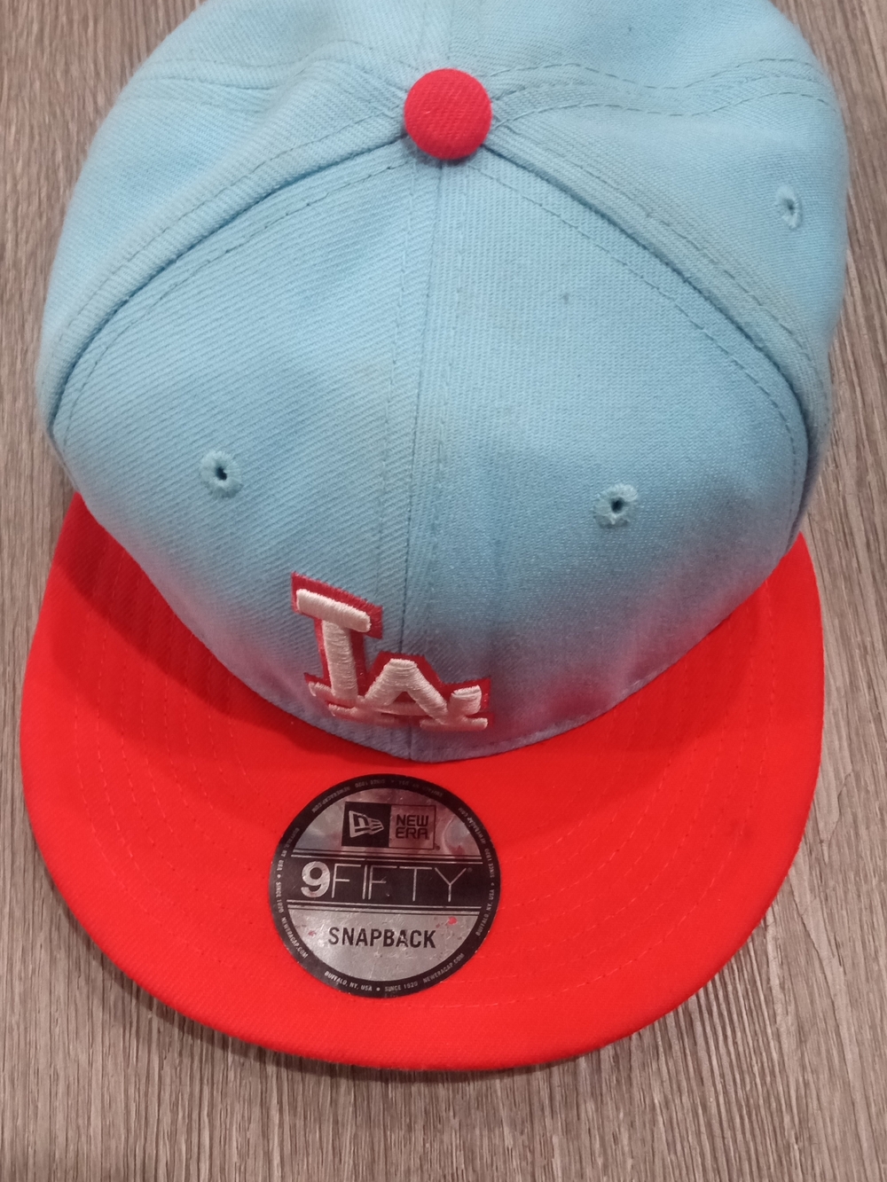 New Era Two-Tone Snapback Hat in Light Blue and Red